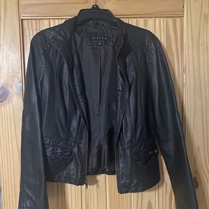 Woman’s faux leather jacket.